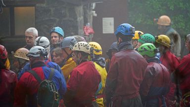 Rescuers near Penwyllt, Powys in the Brecon Beacons, Wales, where a rescue mission is underway to save a man who has been trapped inside a cave in the Ogof Ffynnon Ddu cave system, after falling on Saturday. Because of the injuries suffered in the fall the trapped man is said to be unable to climb out of the cave. Picture date: Monday November 8, 2021.  